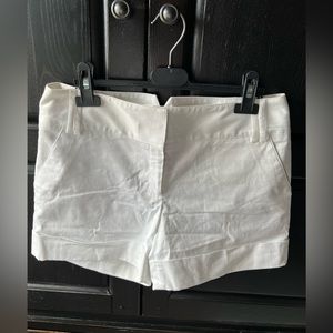 Express white cuffed shorts size 4